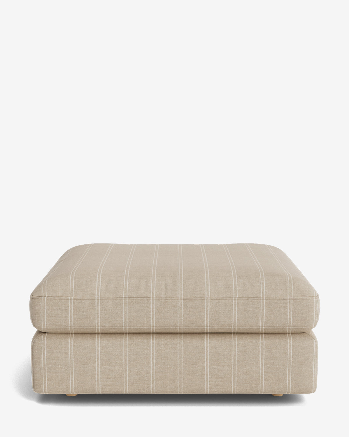 The Vivienne Modular Ottoman features light beige fabric with thin white vertical stripes, a cushioned rectangular top, low wooden legs, and is displayed against a plain white background by McGee & Co.