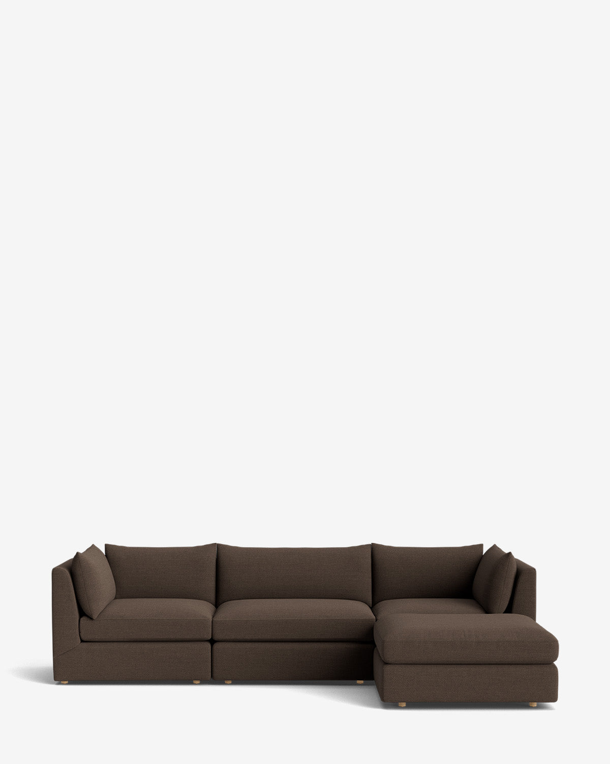 The Vivienne Modular Sofa with Ottoman is a modern handmade dark brown three-seater with a right-side chaise lounge, shown against a plain white background, by McGee & Co.
