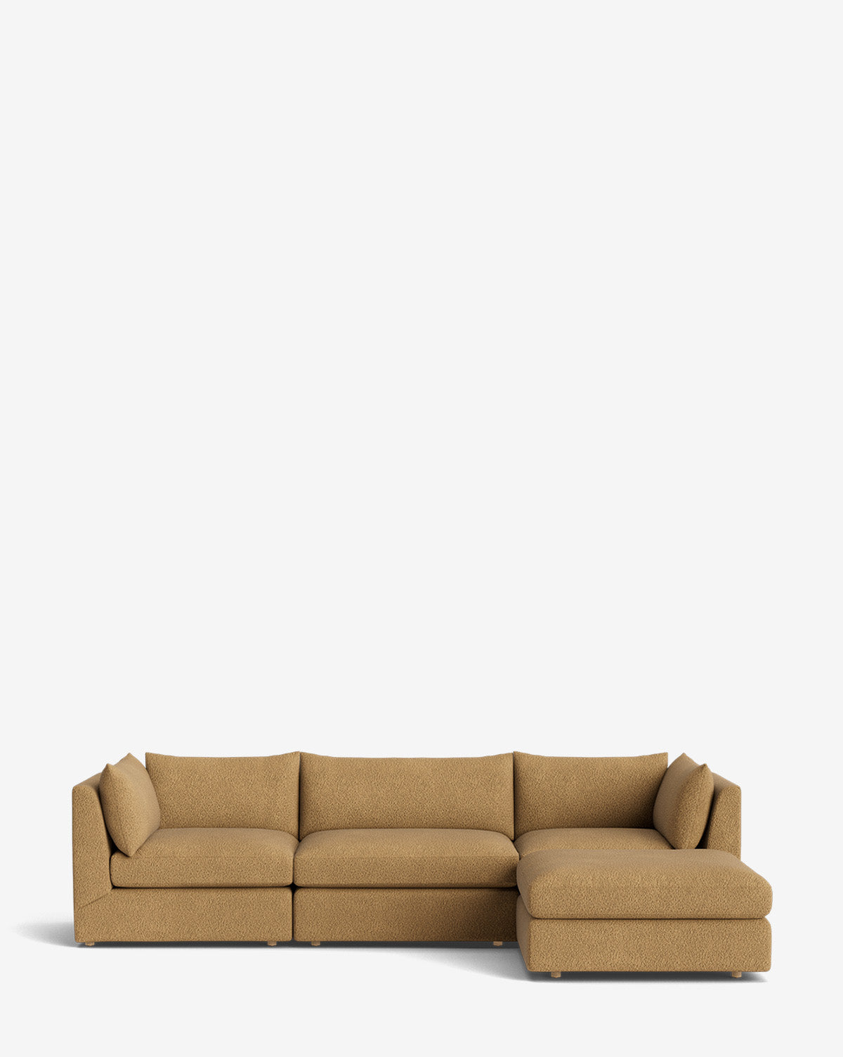 Vivienne Modular Sofa with Ottoman in tan, featuring three seat cushions, a right-side extended chaise lounge, and plush back and side cushions. Handmade with clean lines, shown on a plain white background by McGee & Co.