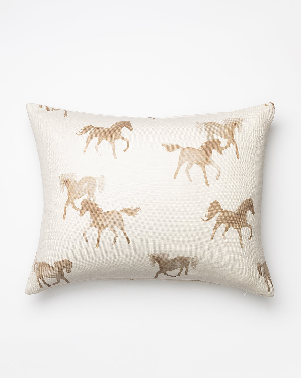 The Watercolor Horses Pillow Cover features a cream background with light brown horses in playful running poses, adding charm and style to any kids bedroom pillow collection, by McGee & Co.