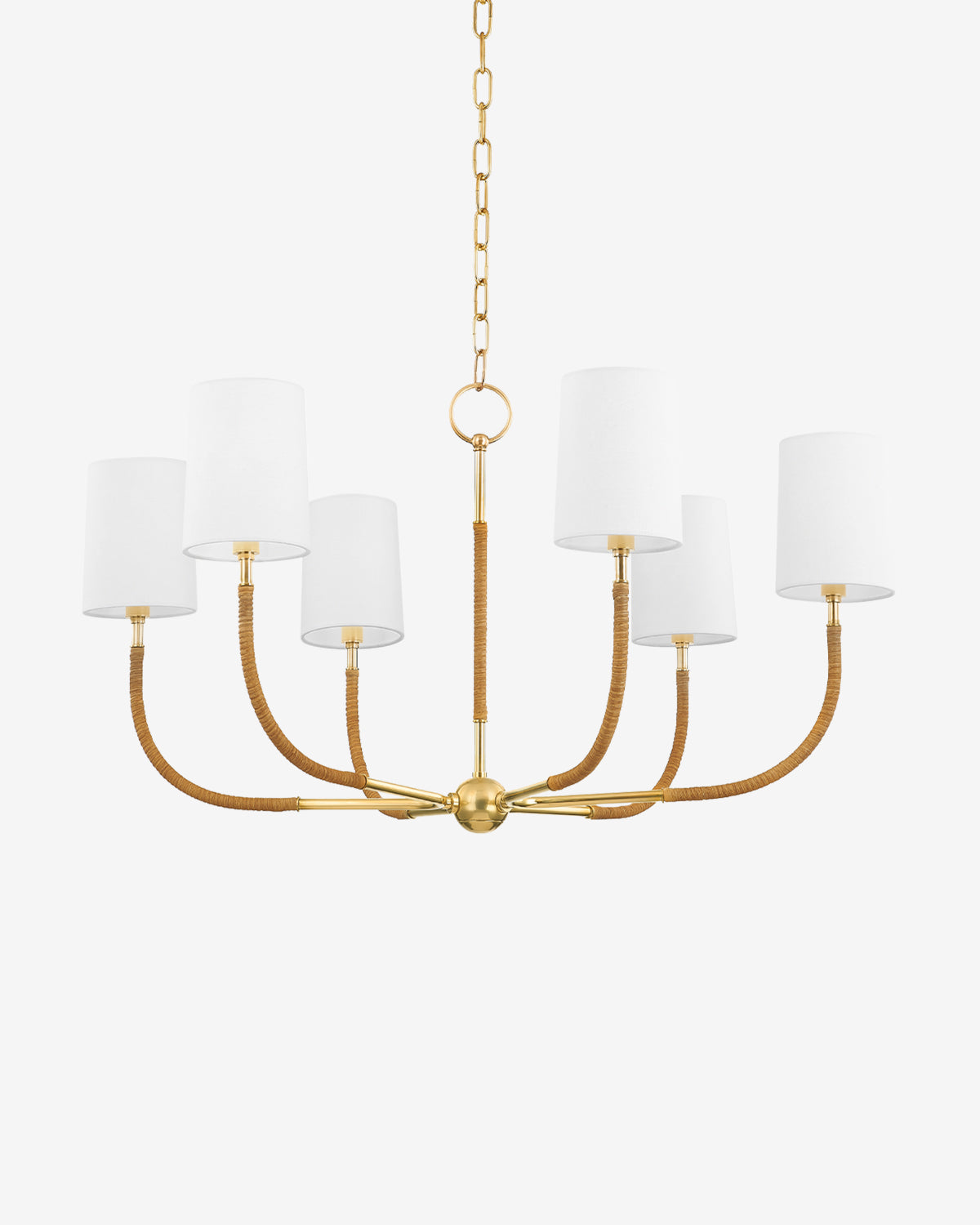 The Hudson Valley Lighting Webson Chandelier features an aged brass finish, six curved arms wrapped in brown rope, white cylindrical lampshades, and hangs from a gold chain. McGee & Co.