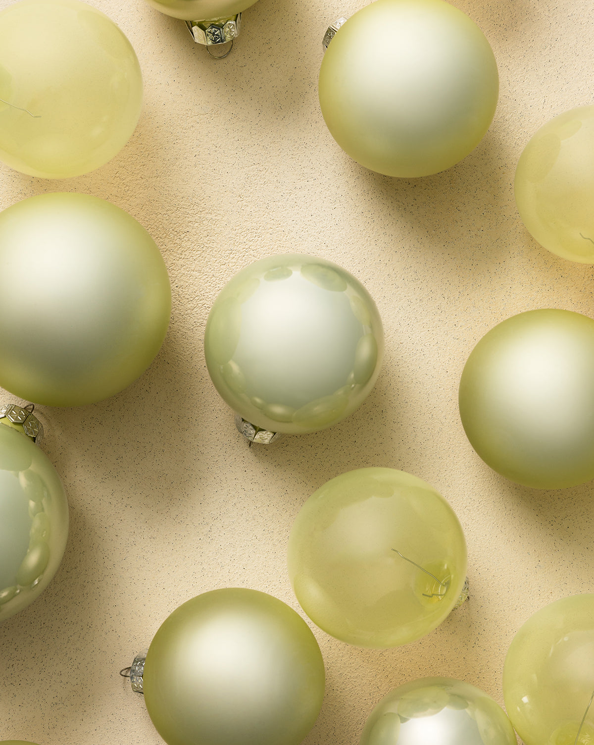 These glossy ornaments with metallic caps bring subtle elegance to your holiday decor, by McGee & Co.