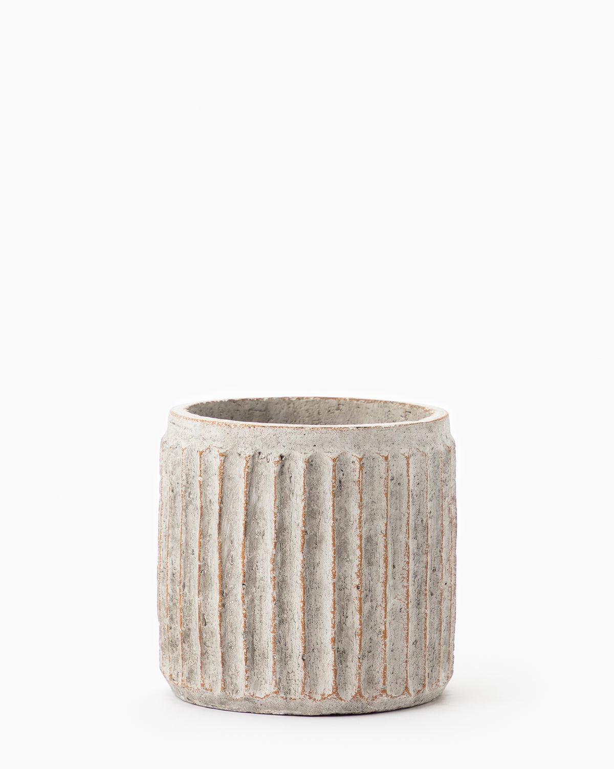 Close up whitewashed pot for plants with ridged design from California Closets