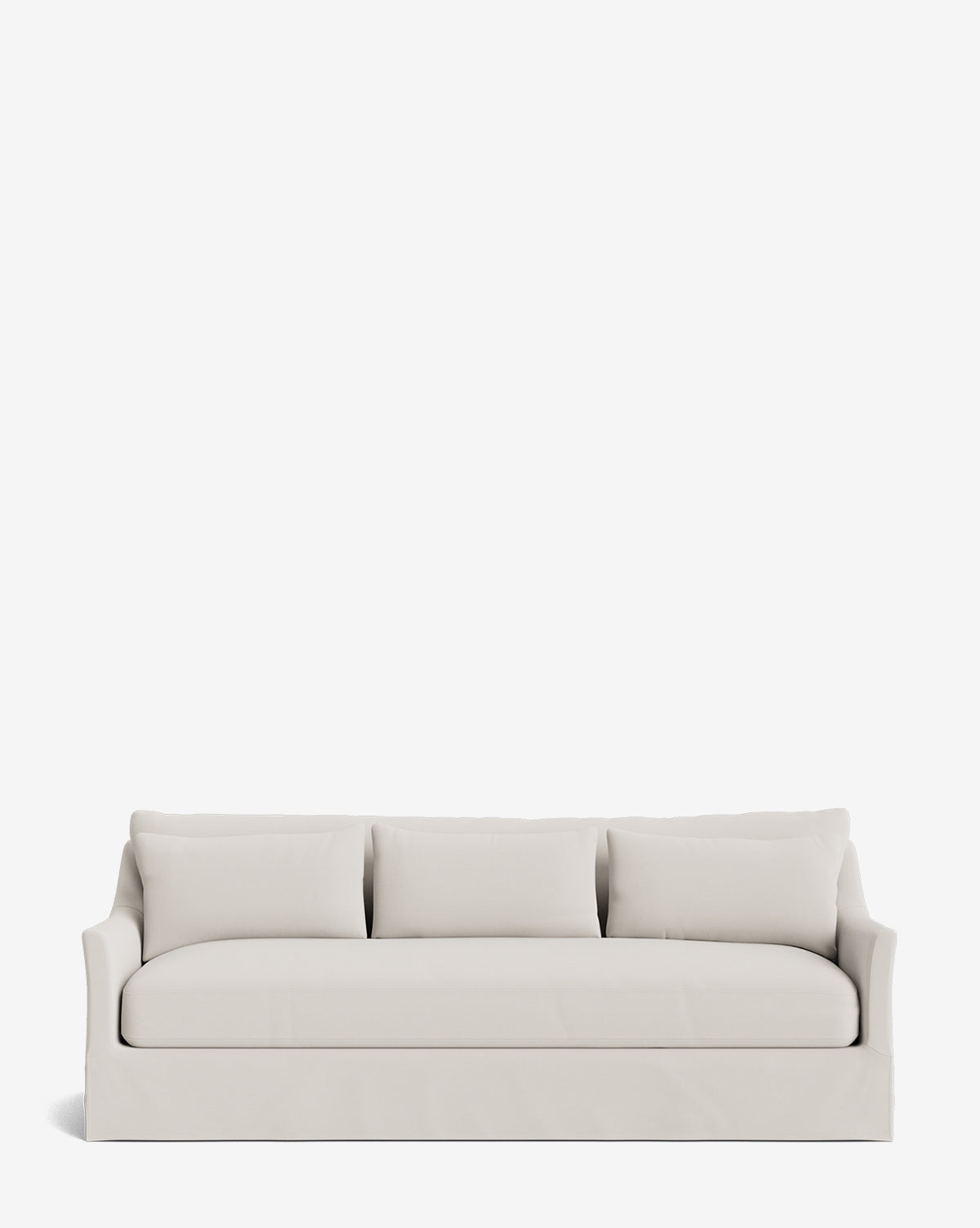 The Wilhelmina Classic Slipcover Sofa (85-110) features a modern, light beige design with three back cushions and clean lines, providing a luxurious seat as shown against a plain white background, by McGee & Co.