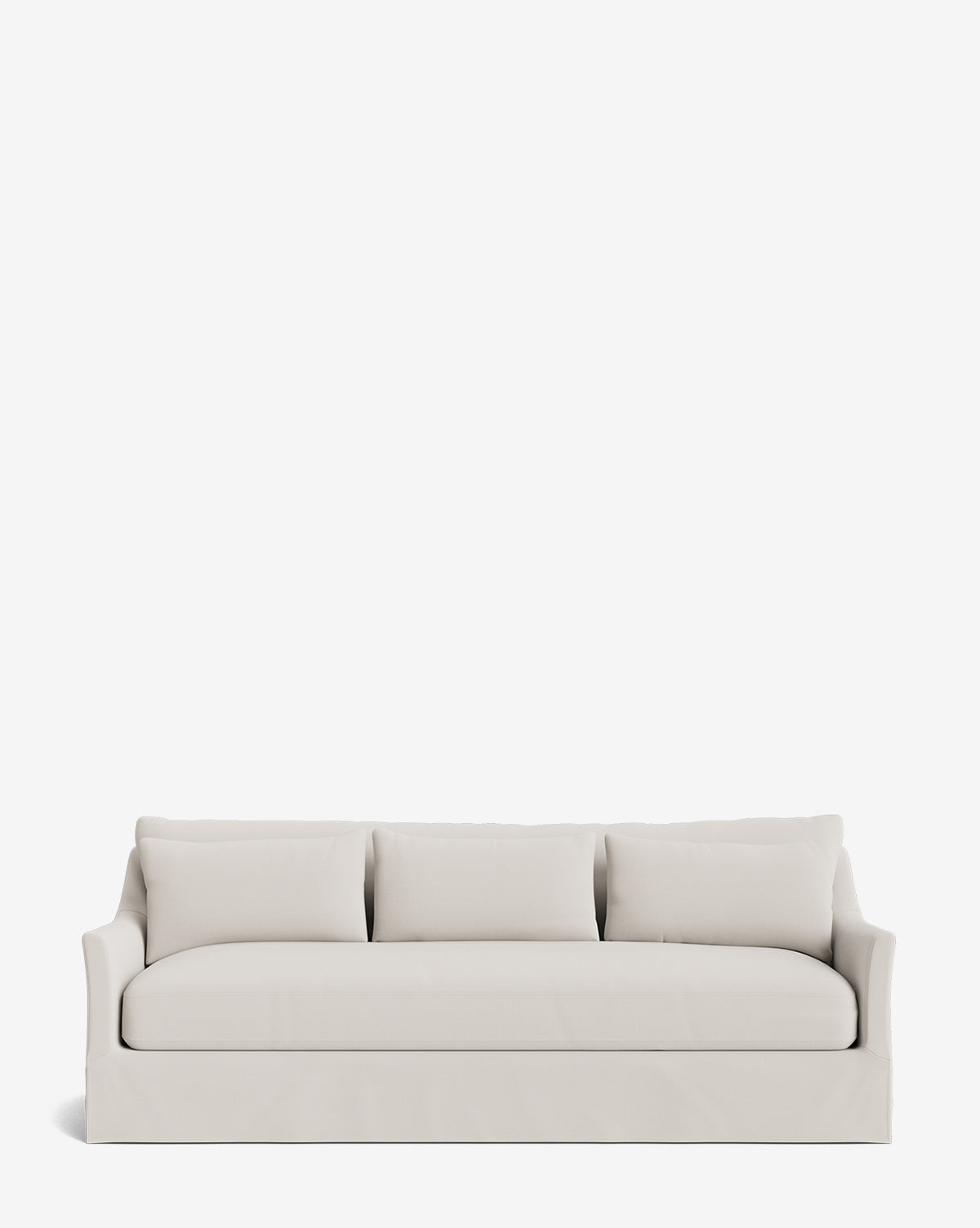 The Wilhelmina Deep Slipcover Sofa (85-110) is a modern three-seater with light beige upholstery, three back cushions, and slightly flared arms, shown against a plain white background by McGee & Co.