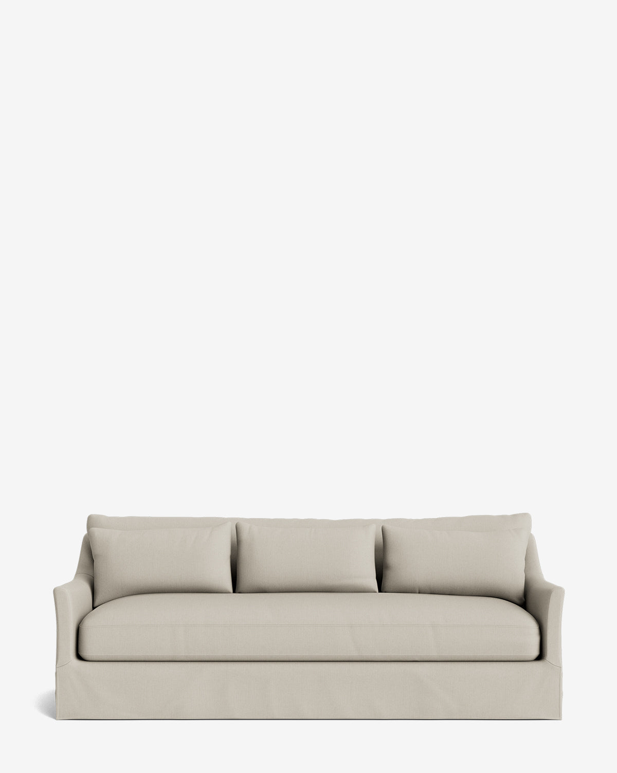 The Wilhelmina Deep Slipcover Sofa (85-110) in beige features three cushions, a skirted base, and slightly flared arms for a luxurious seat, showcased against a plain white background by McGee & Co.