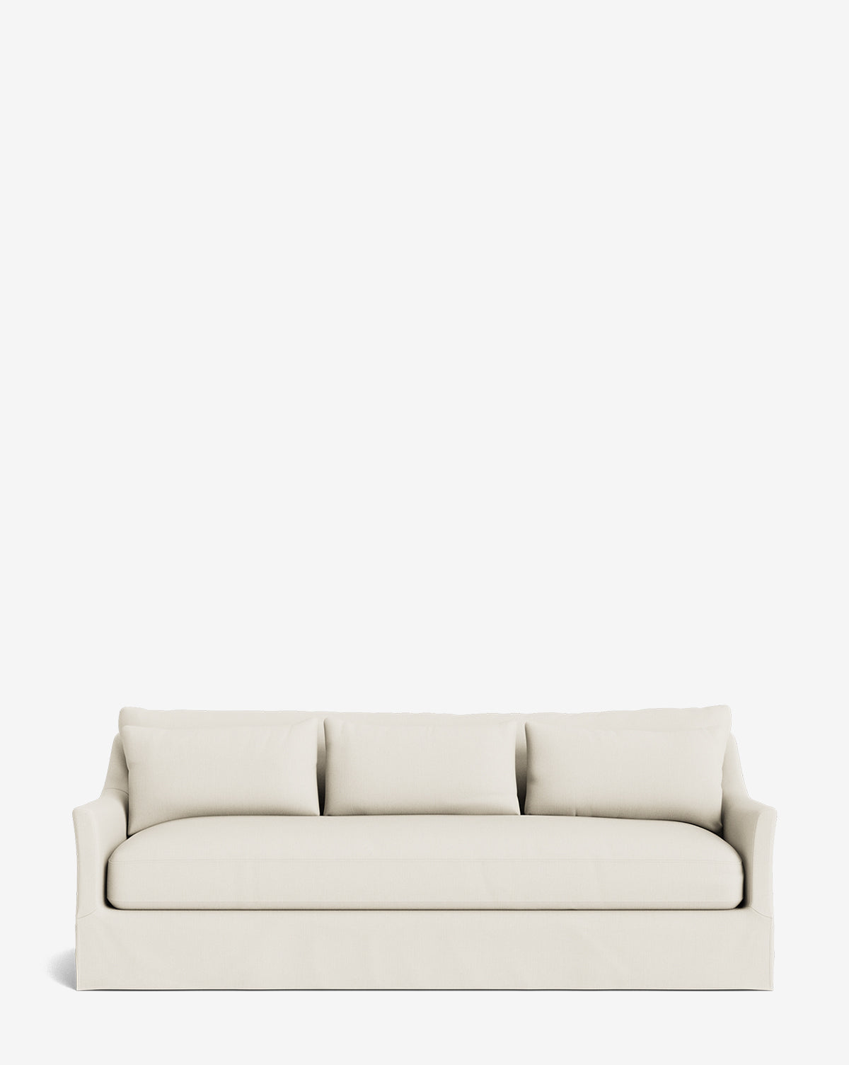 The Wilhelmina Deep Slipcover Sofa (85-110) features a modern cream-colored design with clean lines, three back cushions, and a tailored skirt, providing luxurious seating for three against a plain white background, by McGee & Co.