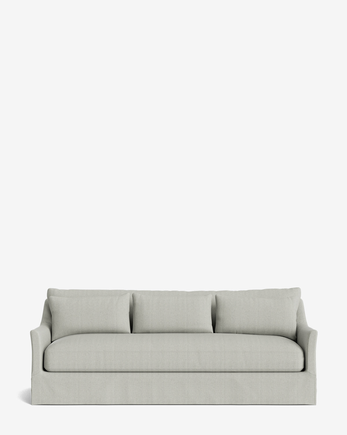 The Wilhelmina Deep Slipcover Sofa (85-110) is a light grey, three-seater with three back cushions and slightly curved armrests, providing a luxurious seat against a plain white background by McGee & Co.