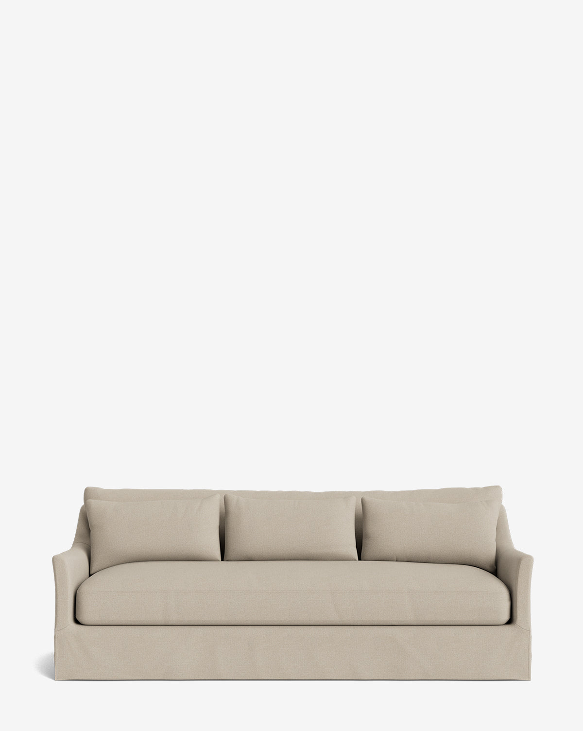 The Wilhelmina Deep Slipcover Sofa (85-110) is a beige, skirted sofa with three back cushions, offering luxurious seating, by McGee & Co. It is displayed against a plain white background.
