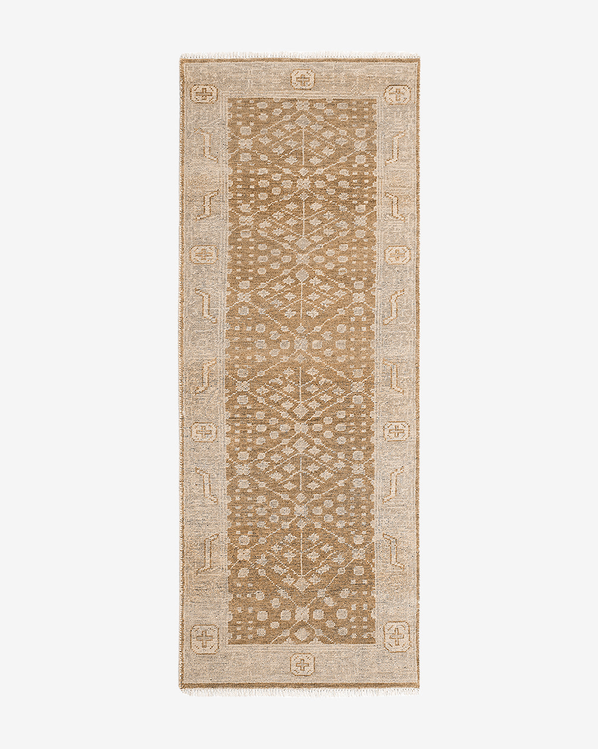 The Windsor Hand-Knotted Wool Rug is rectangular in beige and tan, features a geometric central pattern, decorative border with stylized motifs, and has fringed edges on the shorter sides, by McGee & Co.