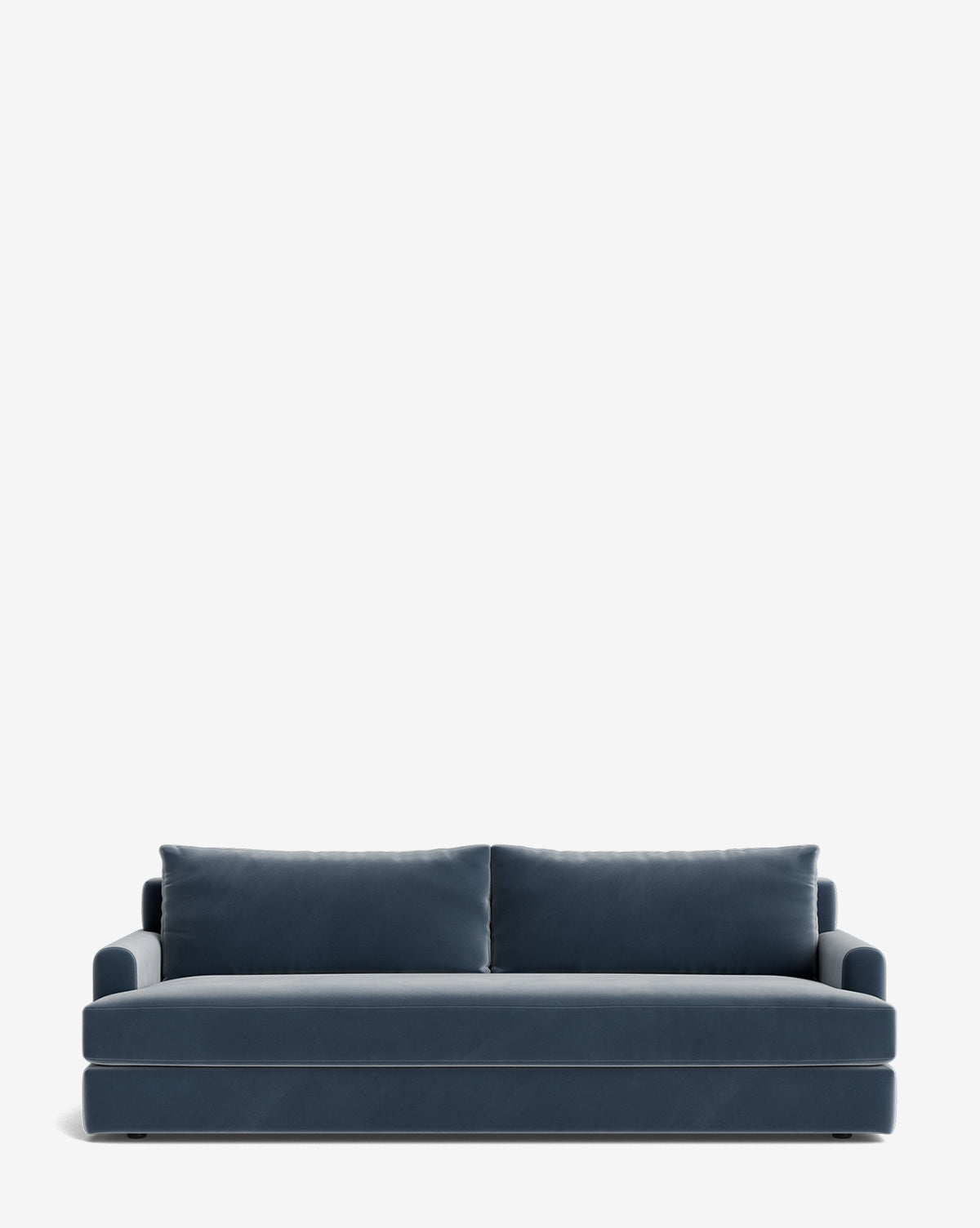 The Winthrop Sofa 90 in blue velvet has two large seat cushions and two backrest pillows, displayed on a plain white background, by McGee & Co.