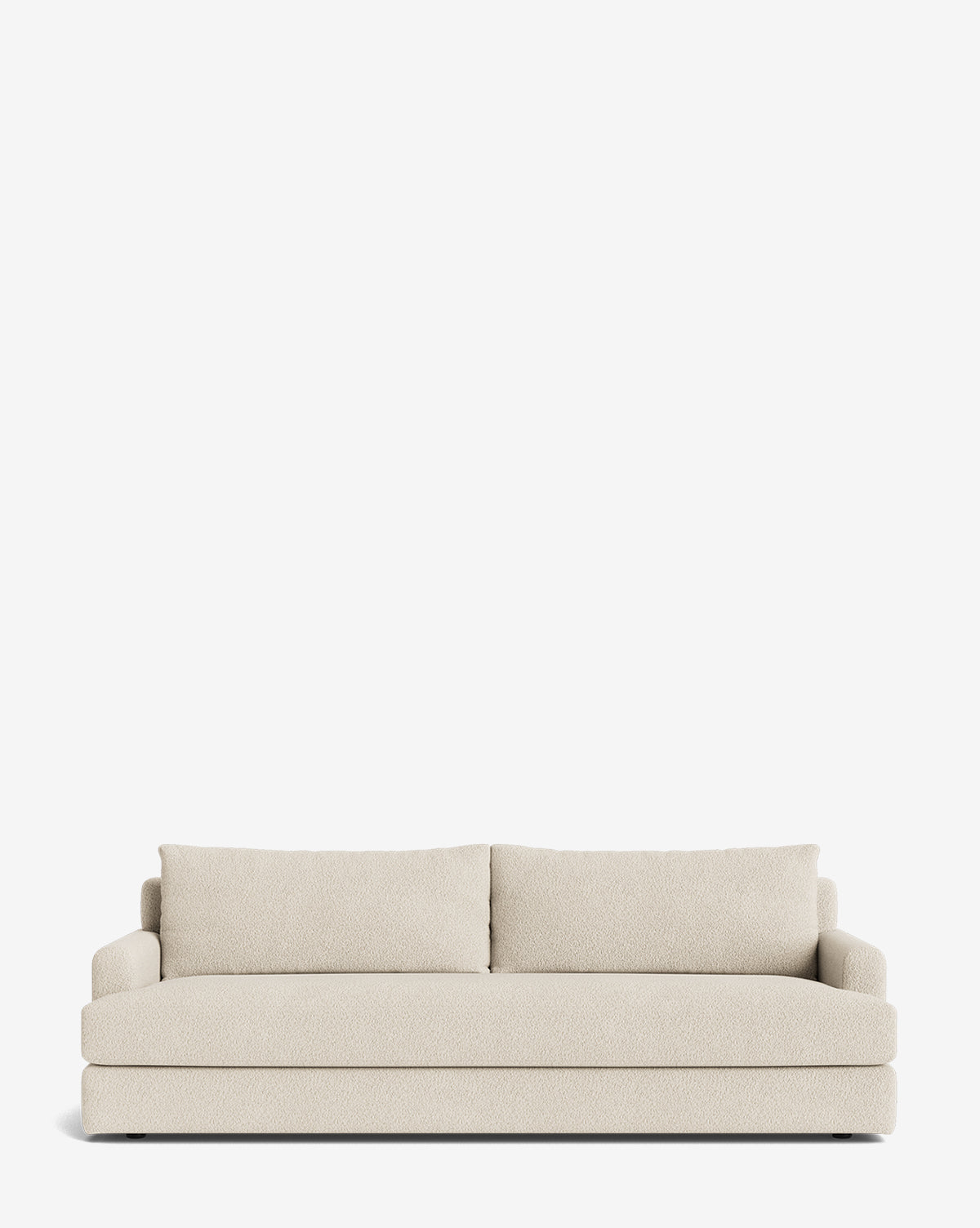 The Winthrop Sofa 90 is a modern, cream-colored sofa featuring two back cushions and square armrests, shown against a plain white background by McGee & Co.