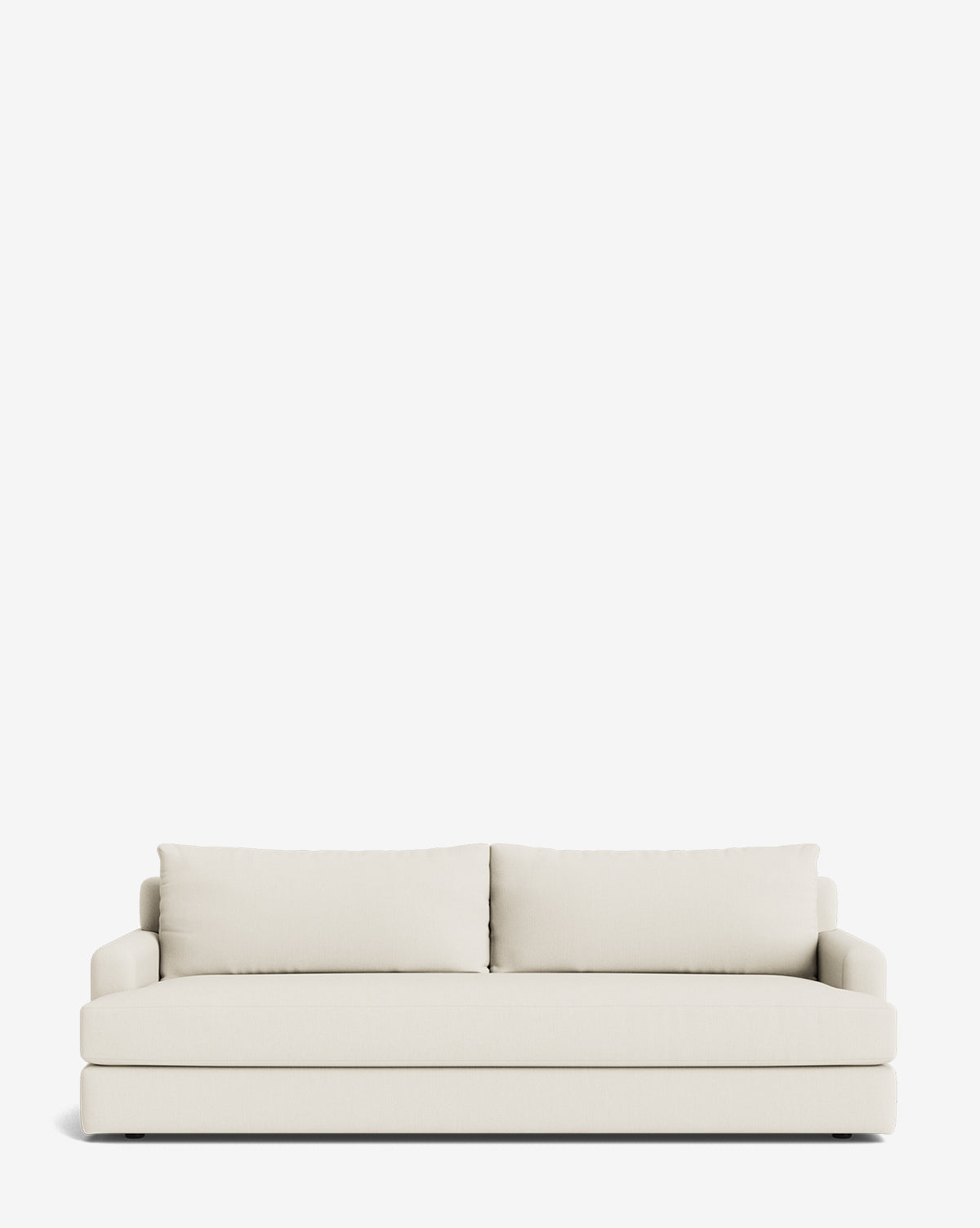 The Winthrop Sofa 90 is a modern, cream-colored sofa with two large back cushions and low armrests. Its minimalist design delivers comfort and sophisticated style, making it a perfect addition to any space by McGee & Co.