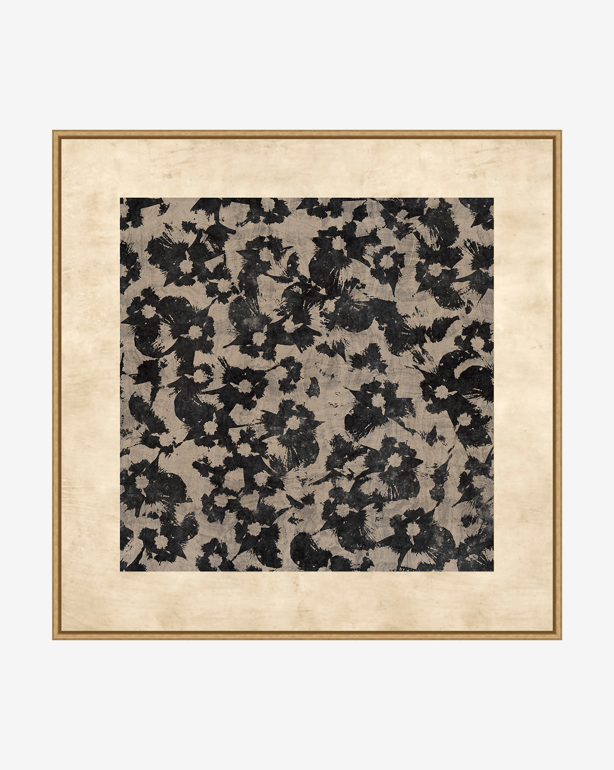 The Woodblocked Botanical is a framed giclee canvas print with a black floral pattern on beige, set in a simple light wood frame and accented by a wide cream mat.