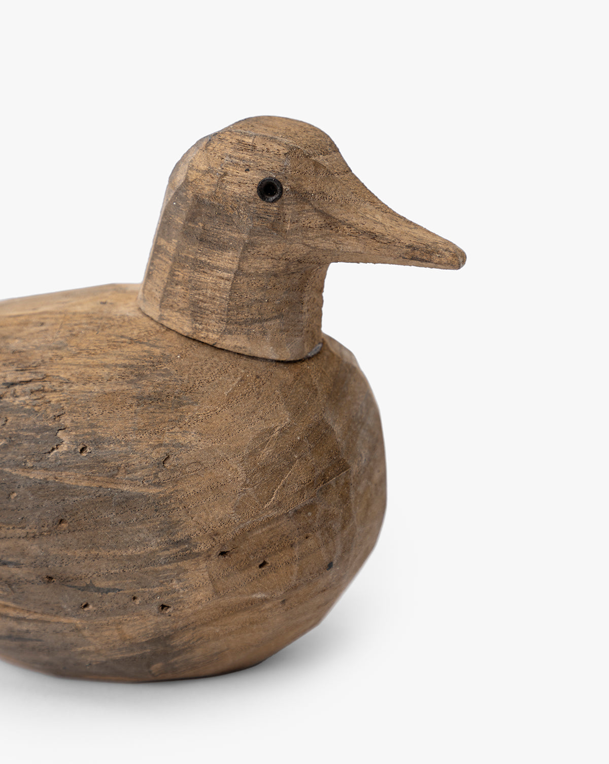 The Wooden Bird Object features a smooth, rounded body, textured surface, carved beak, and small black eye—perfect for home decor and adding nature-inspired style to any space, by McGee & Co.