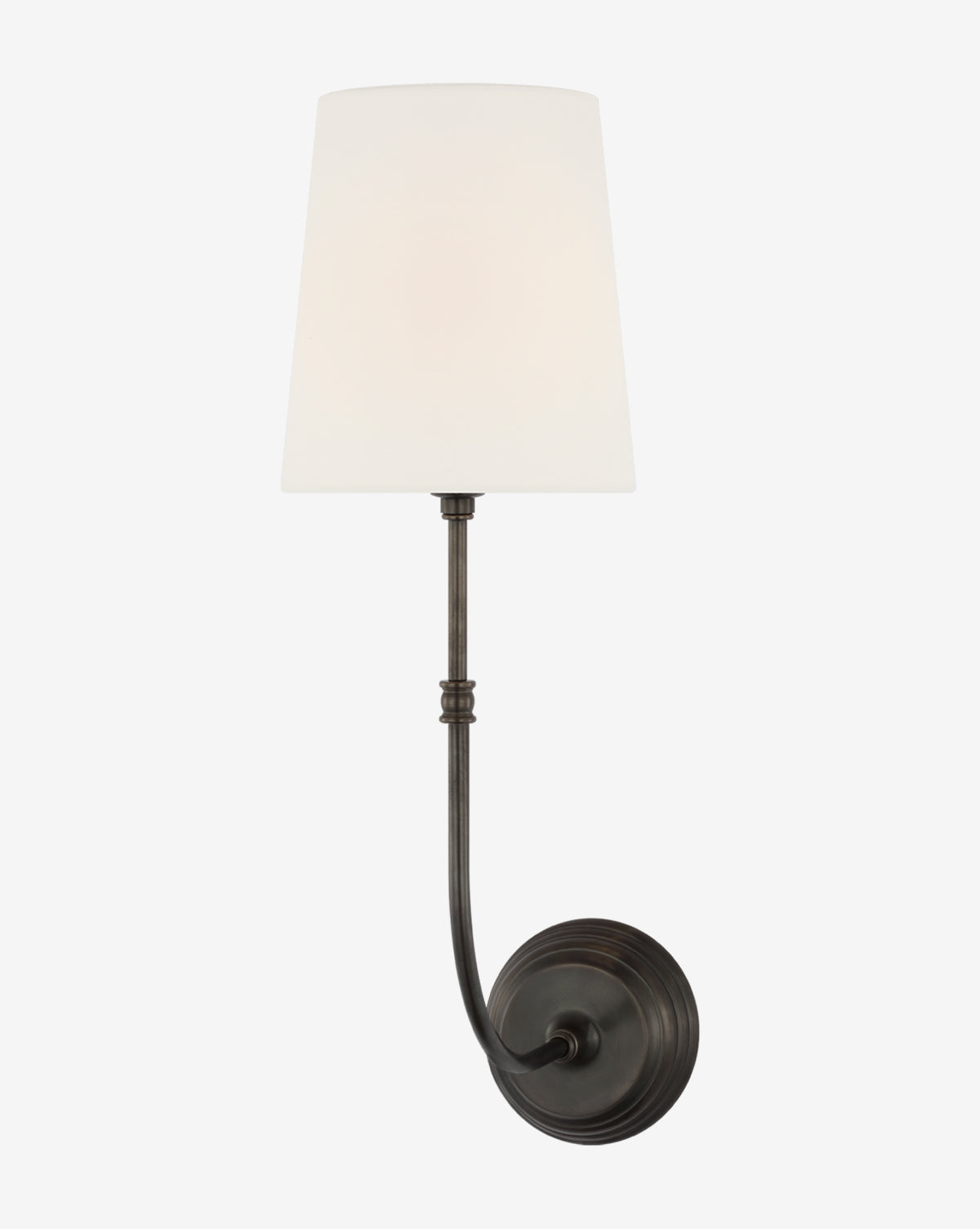 The Wyatt Sconce by Visual Comfort & Co. Signature features a metal design with a round dark base, curved arm, and white linen shade—offering modern elegance and timeless style for any space. McGee & Co.