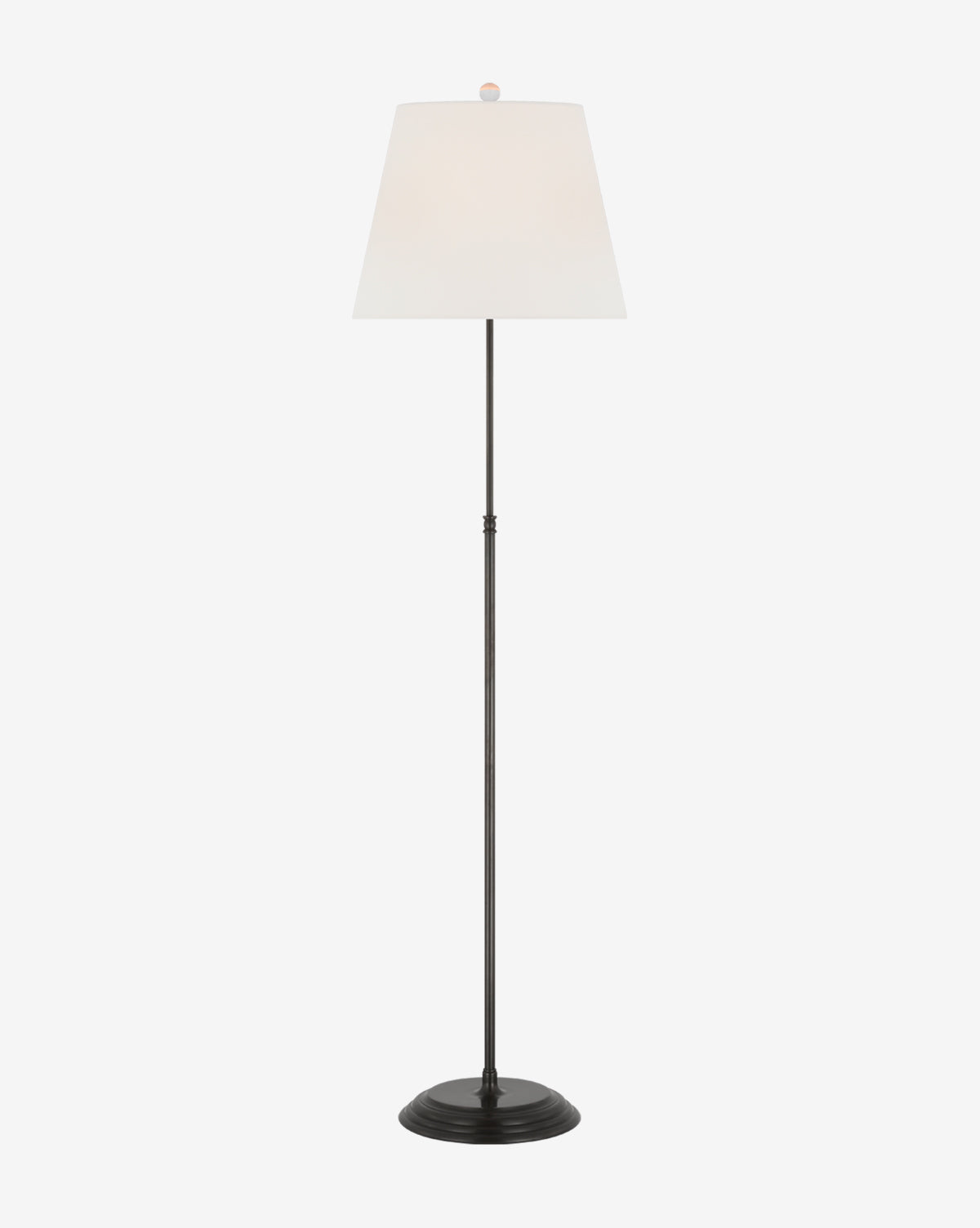 The Wyatt Floor Lamp by Visual Comfort & Co. Signature features a slim metal pole, black round base, and a white linen shade for an elegant silhouette against a plain white background, by McGee & Co.