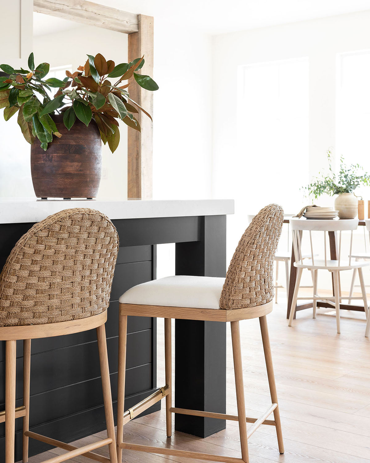 Molly Stools at kitchen bar in rattan and solid oak finishes from McGee & Co.