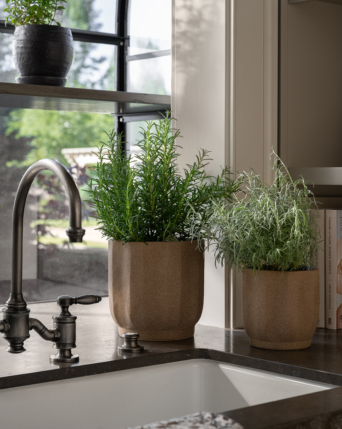 Trella Planter in distressed white terracotta, shown in small and medium sizes side by side, from McGee & Co.