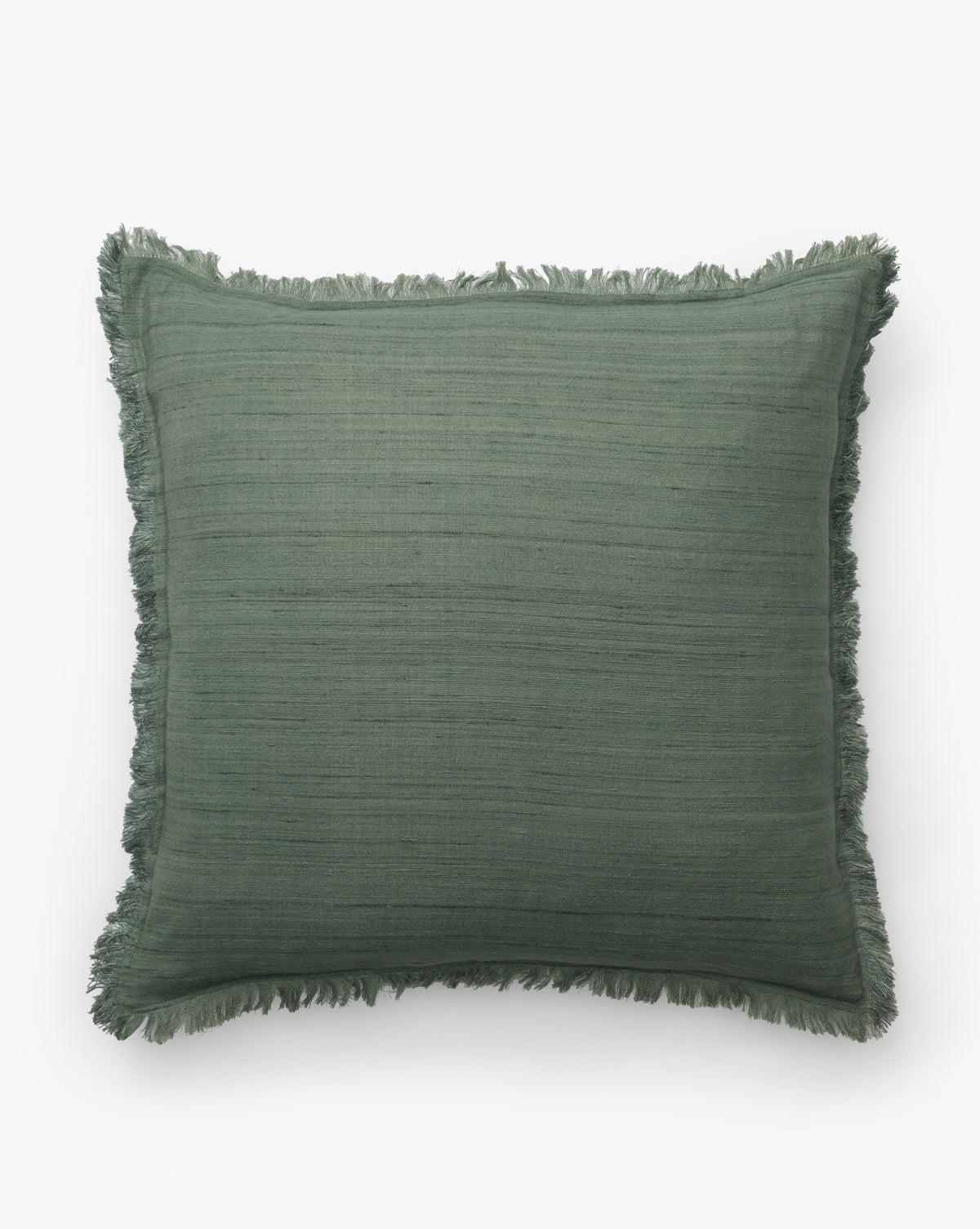 The Abbey Silk Fringe Pillow Cover is a square, green decorative pillow cover with a subtle texture and silk fringe trim along the edges, displayed against a plain white background, by McGee & Co.
