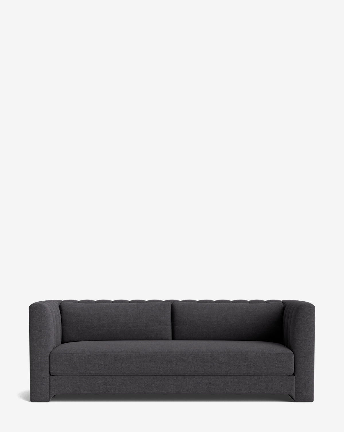 The Agatha Sofa 90 is a modern dark gray sofa with a curved backrest and armrests, showcasing a simple, clean design. This handcrafted piece is photographed against a plain white background, by McGee & Co.