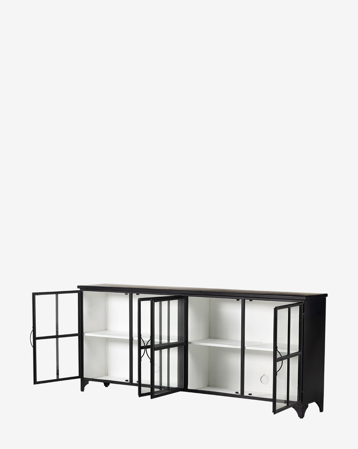 The Amalie Sideboard is a black metal storage piece with four glass-panel doors that open to reveal white shelves and compartments. This sideboard stands on short legs and features a sleek design for modern interiors.