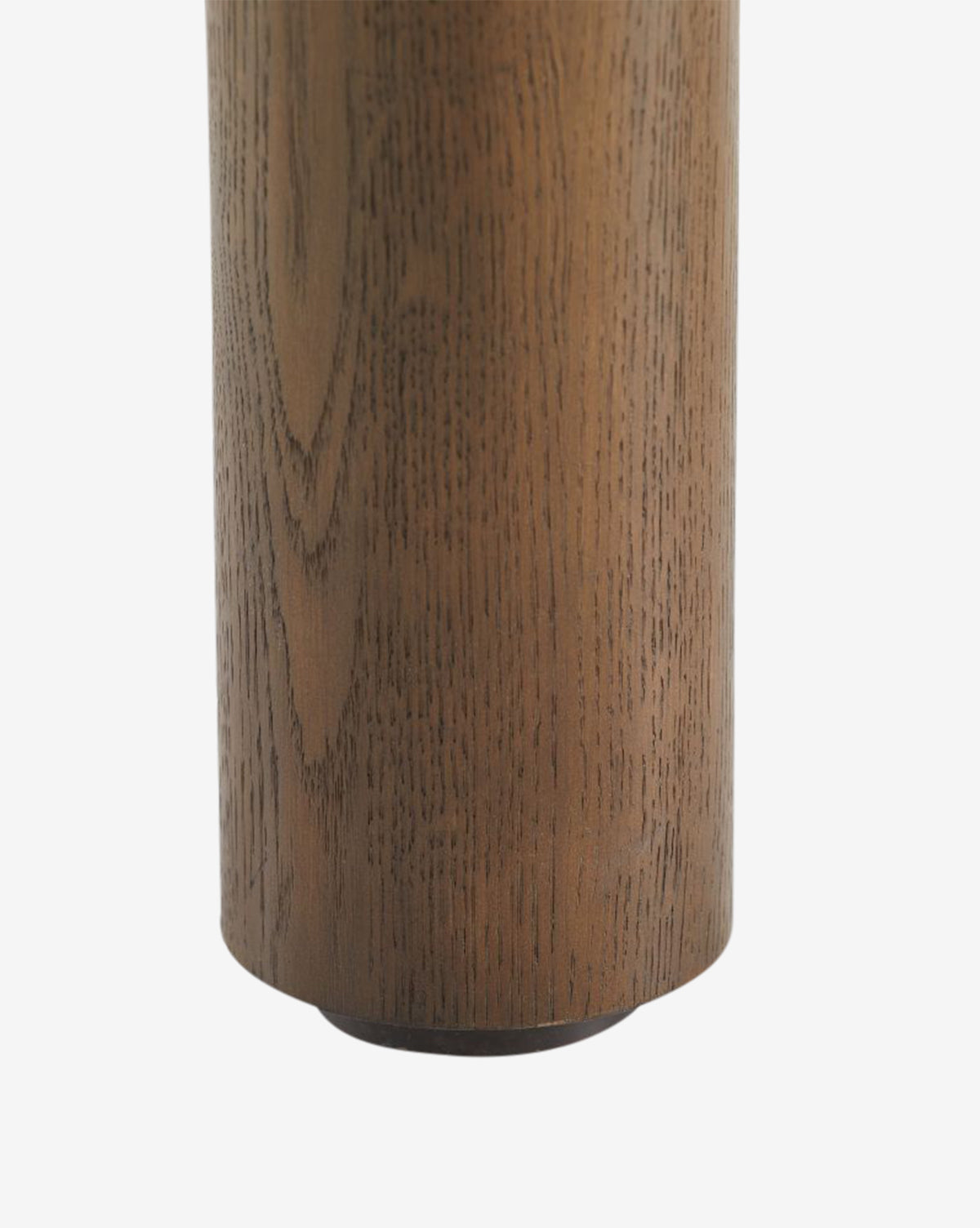 Close-up of the Ashford Dining Table, showing its cylindrical wooden design with a smooth brown finish and visible wood grain, set against a plain white background by McGee & Co.