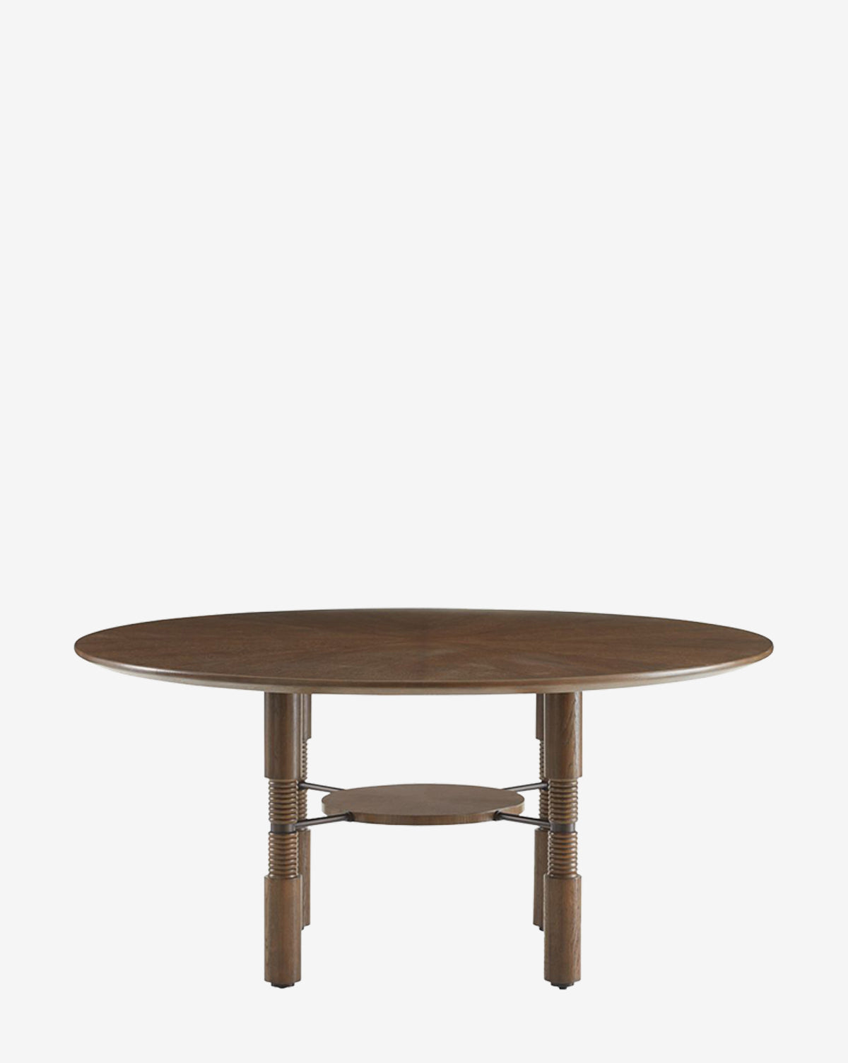The Ashford Dining Table features a vintage-inspired design with a round tortoise oak veneer top, four sturdy legs joined by metal coils, and a circular support shelf underneath, by McGee & Co.