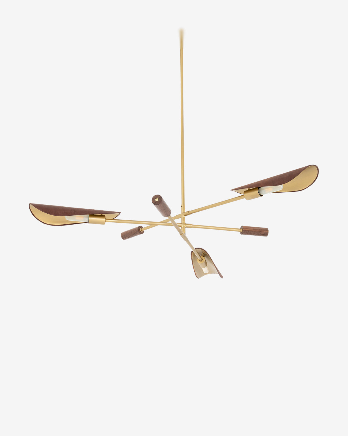 The Four Hands Astrid Chandelier features a modern gold metal frame with three arms, each accented in curved antique brass and dark wood, and hangs elegantly from the ceiling, McGee & Co.
