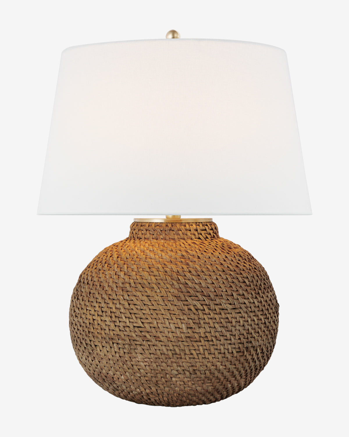 The Avedon Table Lamp features a round woven rattan base and a tapered white linen shade, highlighted against a plain white backdrop for an organic, stylish look by McGee & Co.