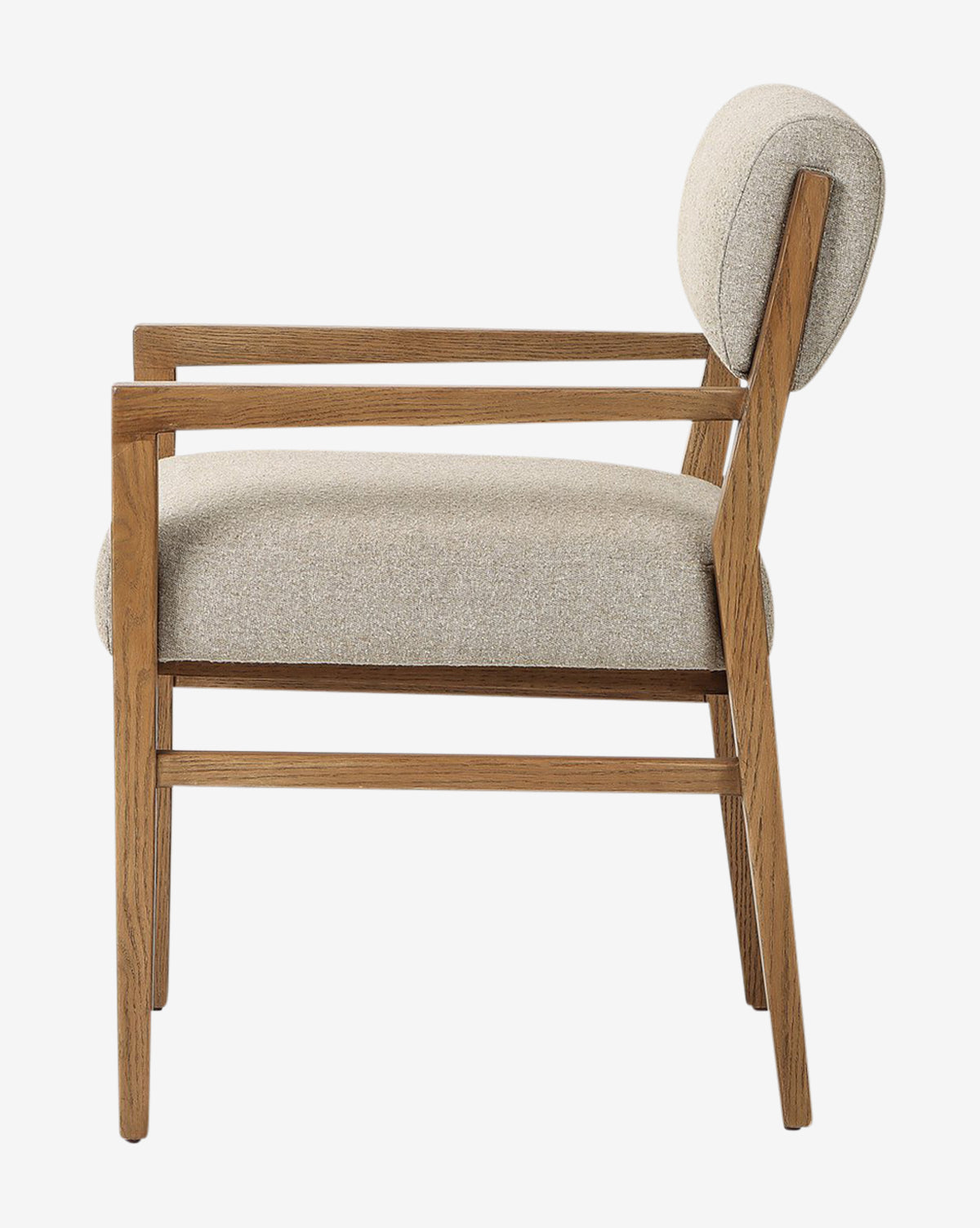 Side view of the Bailey Dining Arm Chair, a modern smoked oak chair with light beige upholstered seat and backrest, featuring clean lines and a minimalist design, by McGee & Co.