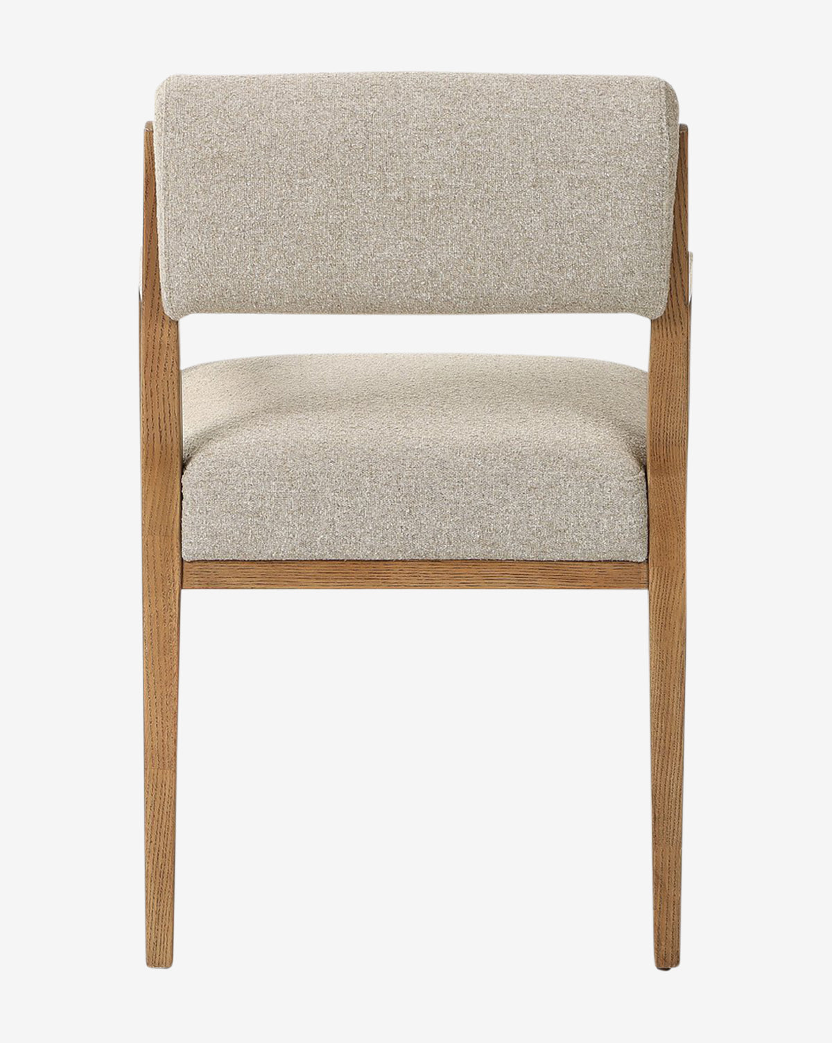 The Bailey Dining Arm Chair features light beige upholstery, a simple smoked oak frame, and straight legs, presented in a front view against a white background by McGee & Co.