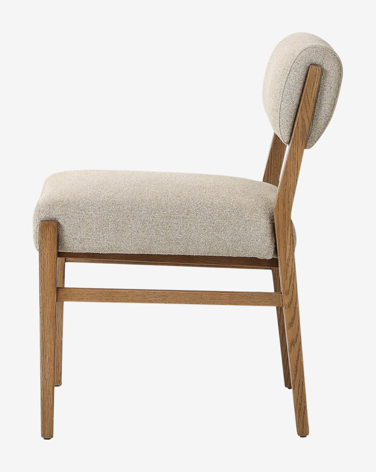A side view of the Bailey Dining Chair shows its smoked oak finish, padded beige seat and backrest, clean lines, and minimalist design—an elegant upholstered chair fit for modern interiors, by McGee & Co.
