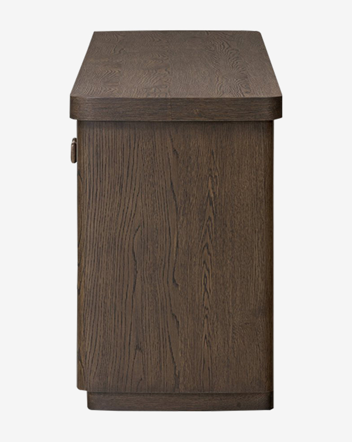 Side view of the Baldwin Sideboard, featuring dark brown oak veneer with visible wood grain and a slightly rounded top edge, by McGee & Co.