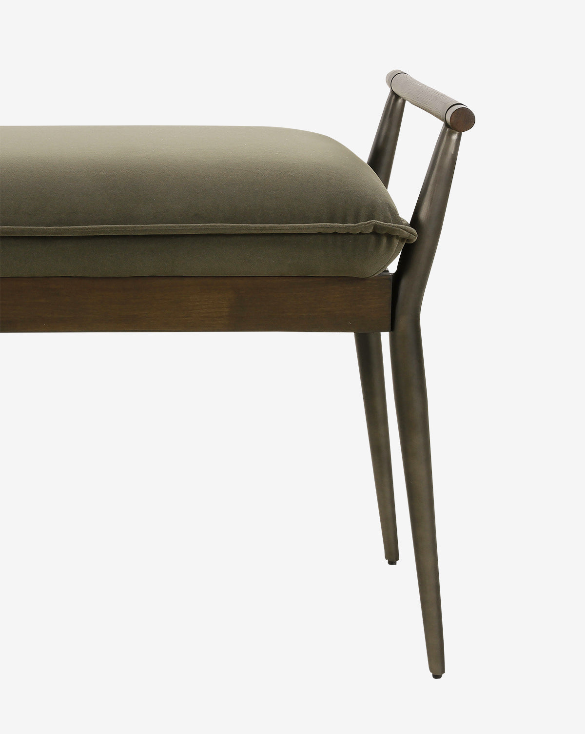 The Balfour Bench showcases slender steel legs, a wooden frame, and an olive-green upholstered cushion. Its minimal backrest has two angled metal supports topped with a wooden rail, all set against a white background by McGee & Co.