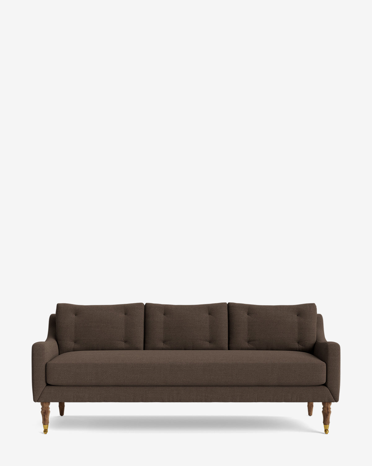 The Barden Sofa 84 is a modern, dark brown three-seater with slim arms, three back cushions, and reeded wood legs with brass accents, shown against a plain white background by McGee & Co.