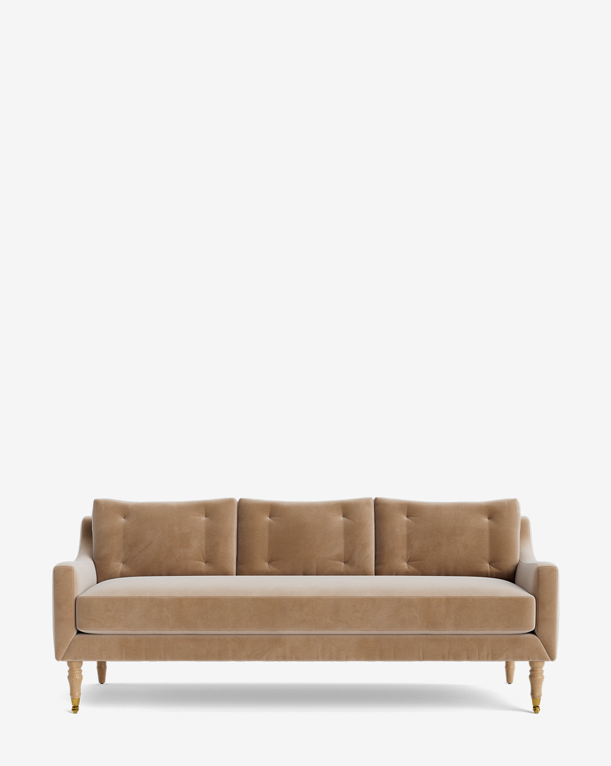 A tan, mid-century modern Barden Sofa 84 with tufted cushions and three seat and back sections, featuring reeded wood legs with gold-tone accents, set against a plain white background by McGee & Co.