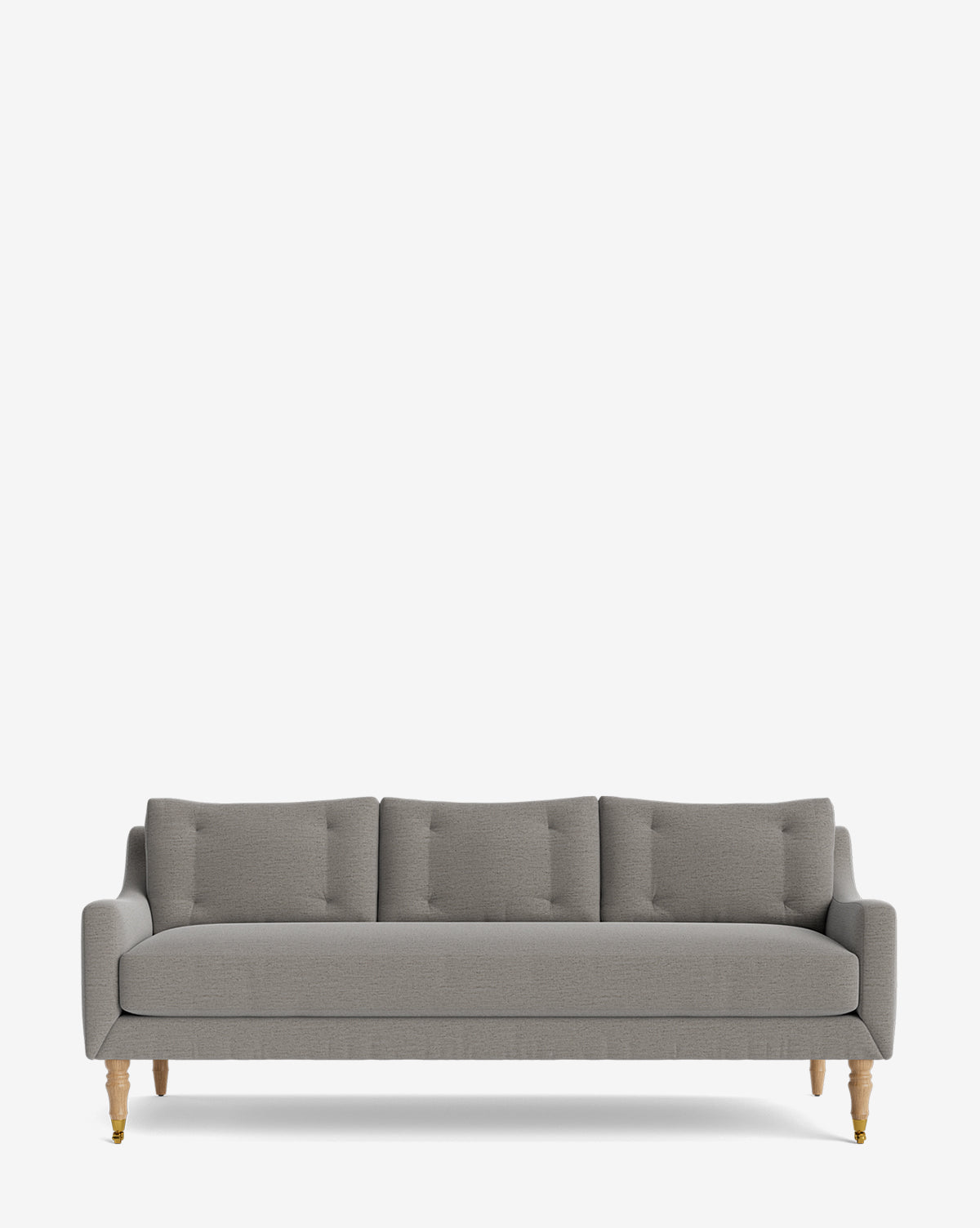 The Barden Sofa 84 is a modern, light gray three-seater with tufted cushions and reeded wood legs, shown against a plain white background by McGee & Co.