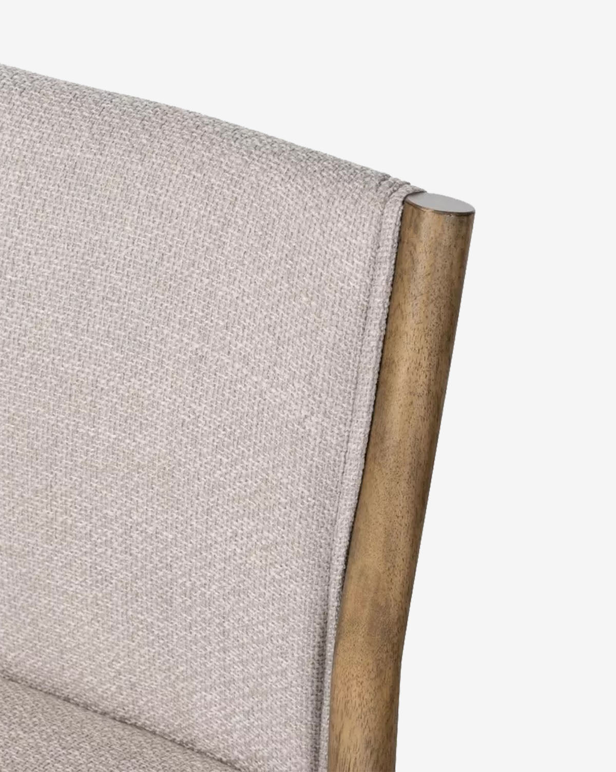 Close-up of the Bardot Dining Chair featuring a light beige high-performance fabric backrest and a smooth parawood frame, shown against a plain white background by McGee & Co.