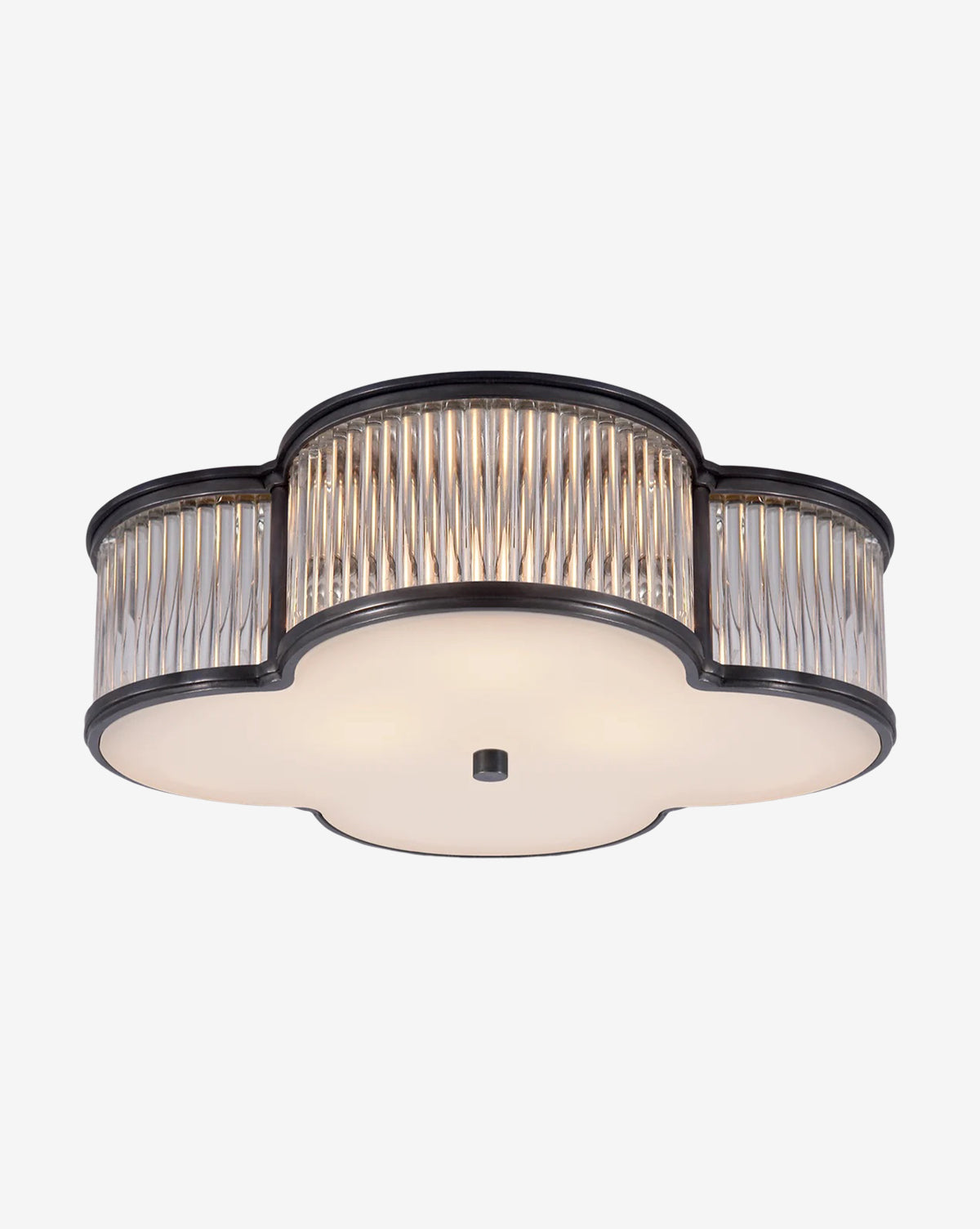 The Basil Flush Mount by Visual Comfort & Co. Signature features a quatrefoil shape, ridged glass sides, a black metal frame, and a frosted glass bottom diffuser. McGee & Co.