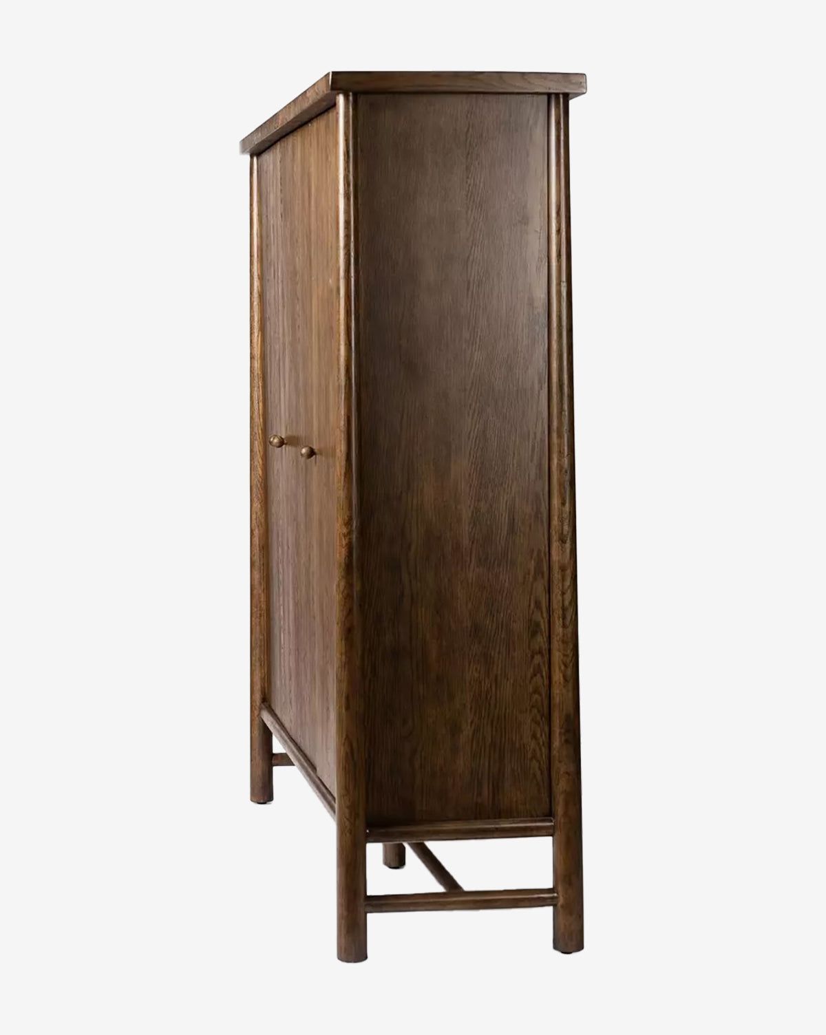Side view of the Beasley 3-Door Cabinet, a tall rectangular piece in dark toasted oak with a dark finish, featuring two slim knobs and four straight legs connected by horizontal supports by McGee & Co.