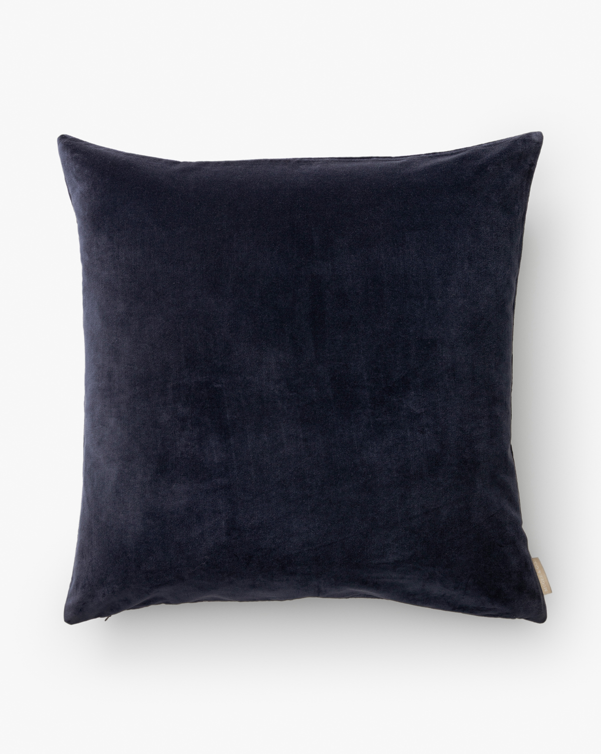 Shown here the Bellevue pillow cover in a deep stone-blue finish from by McGee & Co.