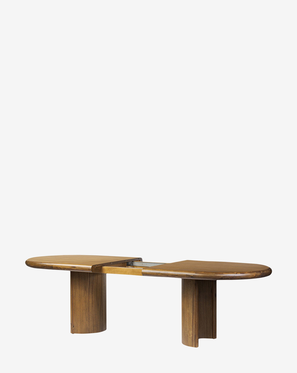 The Belvedere Extension Dining Table features a modern acacia wood design with smooth, polished finish, and includes unique details like overlapping surfaces, cylindrical legs, and a central cut-out section, by McGee & Co.