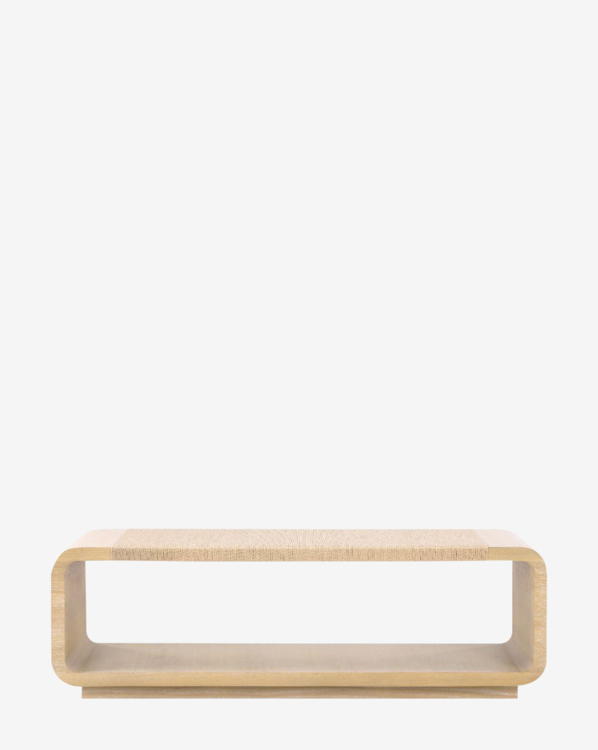 The Bence Coffee Table is a modern, light oak piece with rounded corners and open sides, featuring a rectangular hollow design on a flat base, shown against a plain white background by McGee & Co.