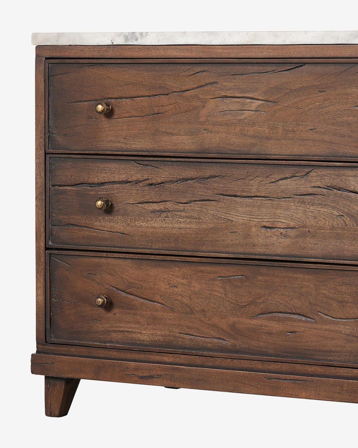 The Bettiga Nightstand is crafted from antique reclaimed wood with a natural, rustic finish, featuring three drawers with brass hardware and topped with white marble. Visible grain and texture highlight its artisanal charm, by McGee & Co.