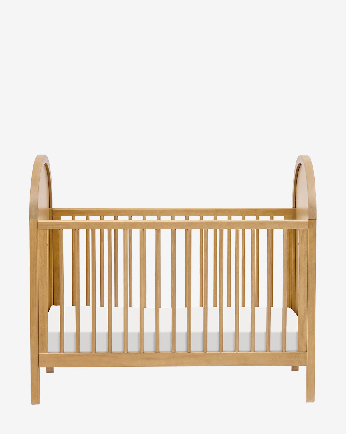 The Bondi Cane 3-in-1 Convertible Crib with Toddler Bed Conversion Kit features vertical slats, rounded ends, and a natural wood finish in a modern design, shown against a plain white background by McGee & Co.