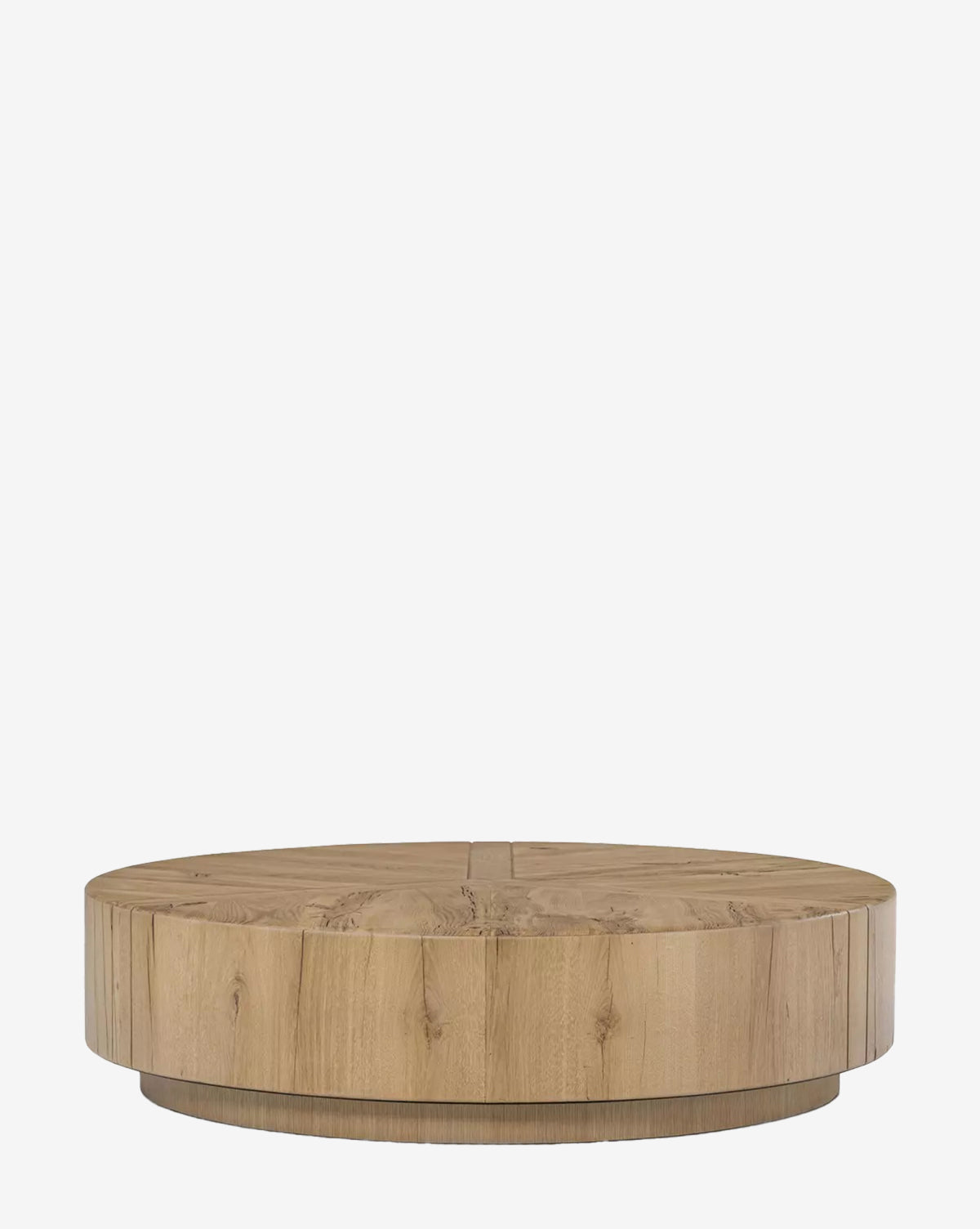 The Boykin Coffee Table features a round shape, light wood finish, and smooth surface with a minimalistic contemporary design, shown against a plain white background by McGee & Co.