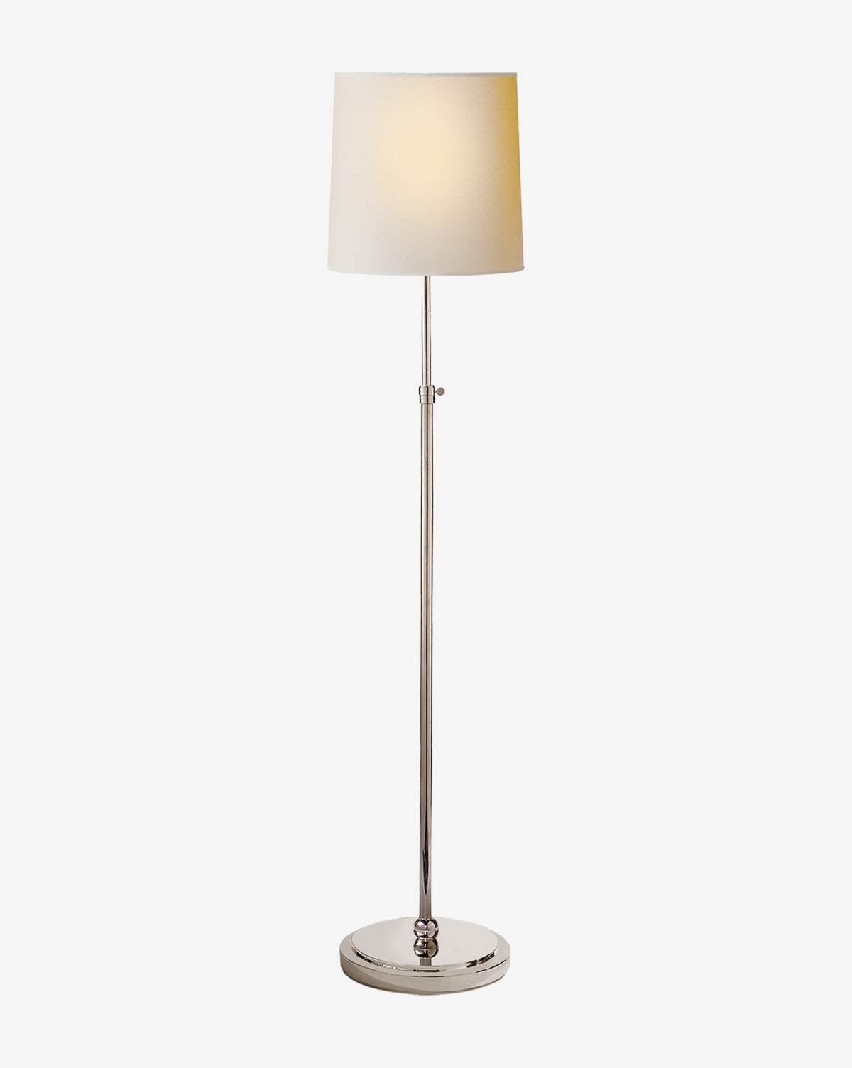 The Bryant Floor Lamp features a slim metallic stand, round base, and simple white linen shade—its modern classic style is perfectly showcased against a plain white background, by McGee & Co.