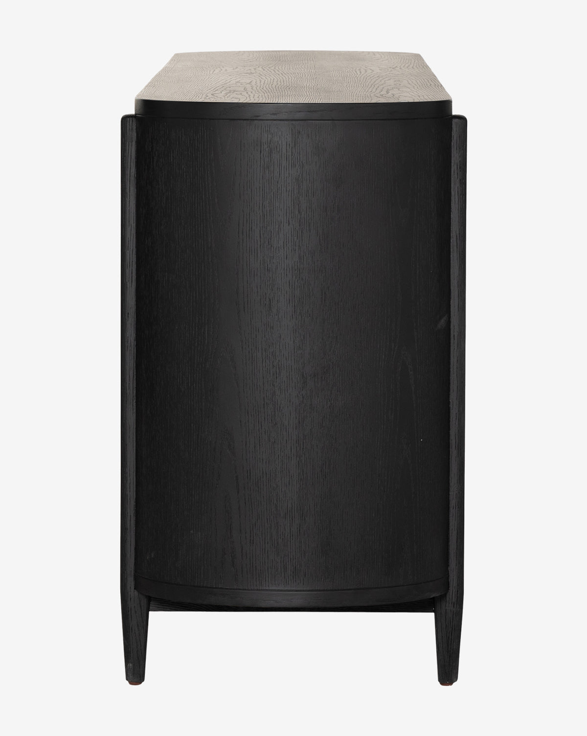 The Burton Sideboard, a modern black wooden piece with a curved front and slender legs, is shown from the side against a plain white background, resembling a compact nightstand by McGee & Co.