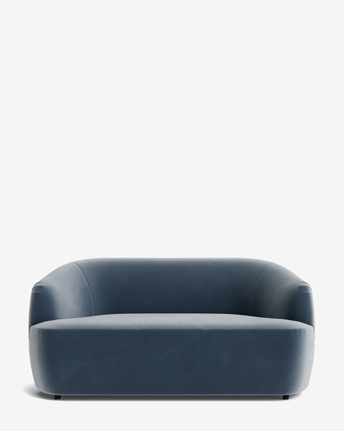 The Byron Settee 68 is a modern, minimalist blue settee featuring a curved back, rounded arms, and smooth fabric upholstery, displayed against a plain white background by McGee & Co.